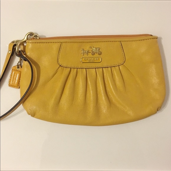 Coach Handbags - Yellow Coach Wristlet